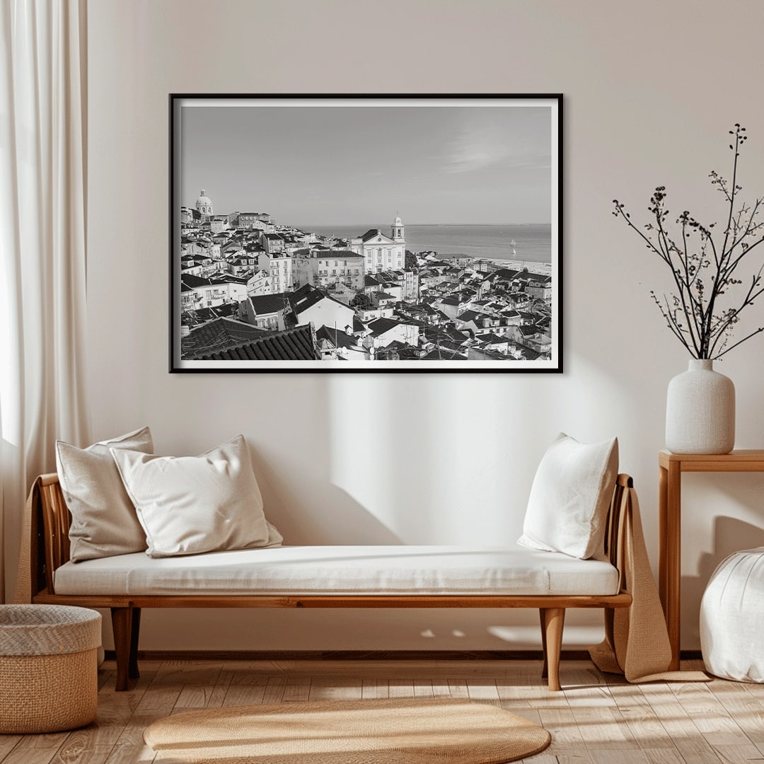 Black and white landscape poster of Alfama Lisbon Old City with traditional buildings and Tagus River by artist Alfama Lisbon, framed and displayed in home decor