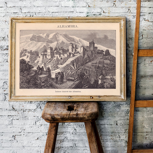 Vintage illustration poster of Alhambra palace with mountains and vegetation by The Institute of Liepzig, framed and displayed in home decor