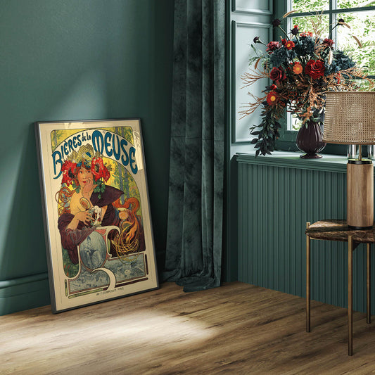 Art Nouveau poster of a woman with flowers in her hair holding a beer glass Bières De La Meuse by Alphonse Mucha, framed and displayed in home decor