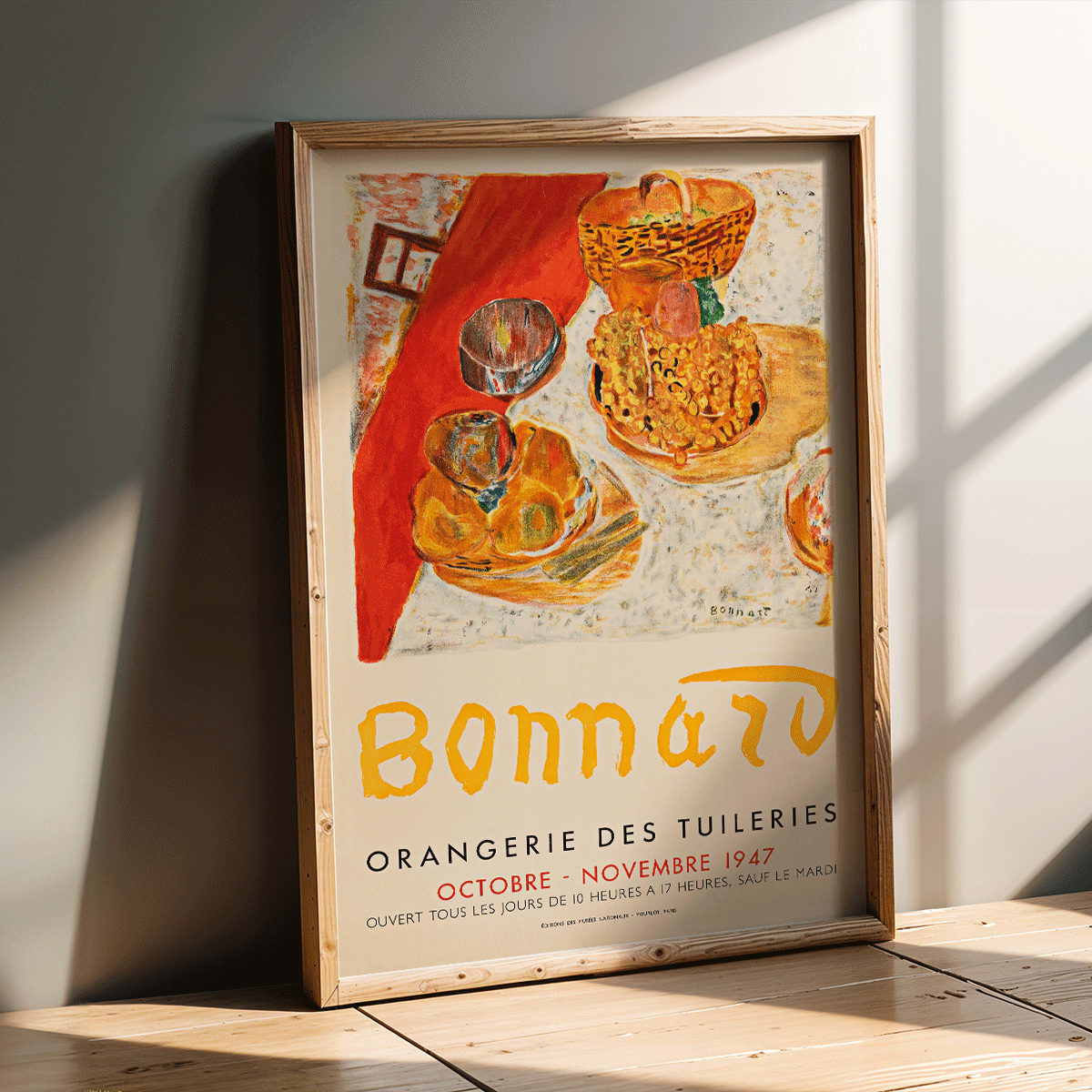 Poster for Exposition Bonnard at Orangerie des Tuileries featuring vibrant still life painting by artist Bonnard, framed and displayed in modern living room decor