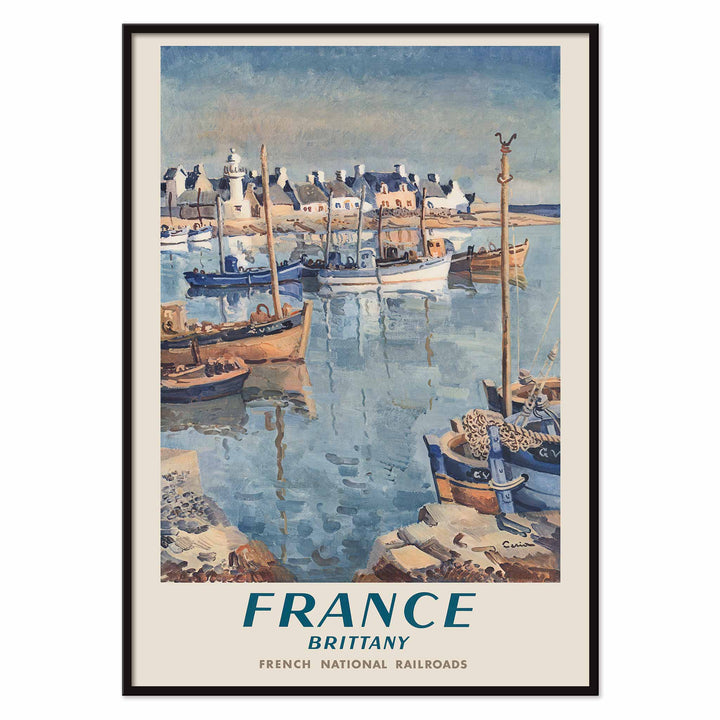 France Brittany Railway poster by Edmond Ceria featuring blue harbor boats, pale village roofs, cream sky, and coastal scenery, with black aluminium frame on white background