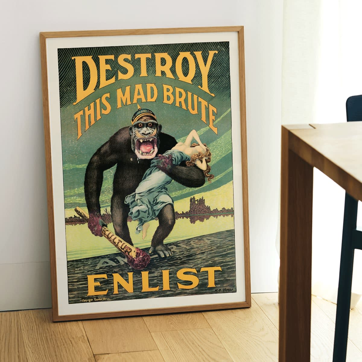 Destroy this mad brute by Harry Ryle Hopps poster featuring a gorilla holding a woman and a club labeled Kultur with enlistment message, framed and displayed in home decor