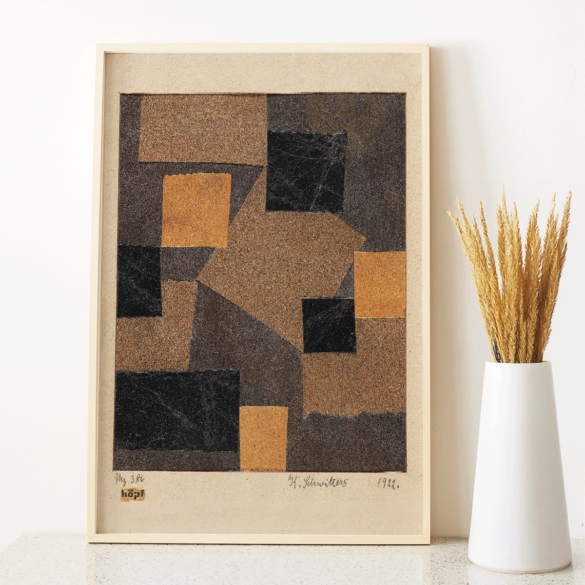 Abstract collage poster with black and brown geometric shapes by Kurt Schwitters Mz 386 Hopf Merzzeichnung, framed and displayed in modern living room decor