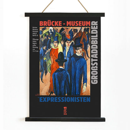 Colorful Berlin Street Scene at Brücke Museum by Ernst Kirchner featuring people in vibrant attire and expressionist artwork poster, with wooden magnetic frame on white background