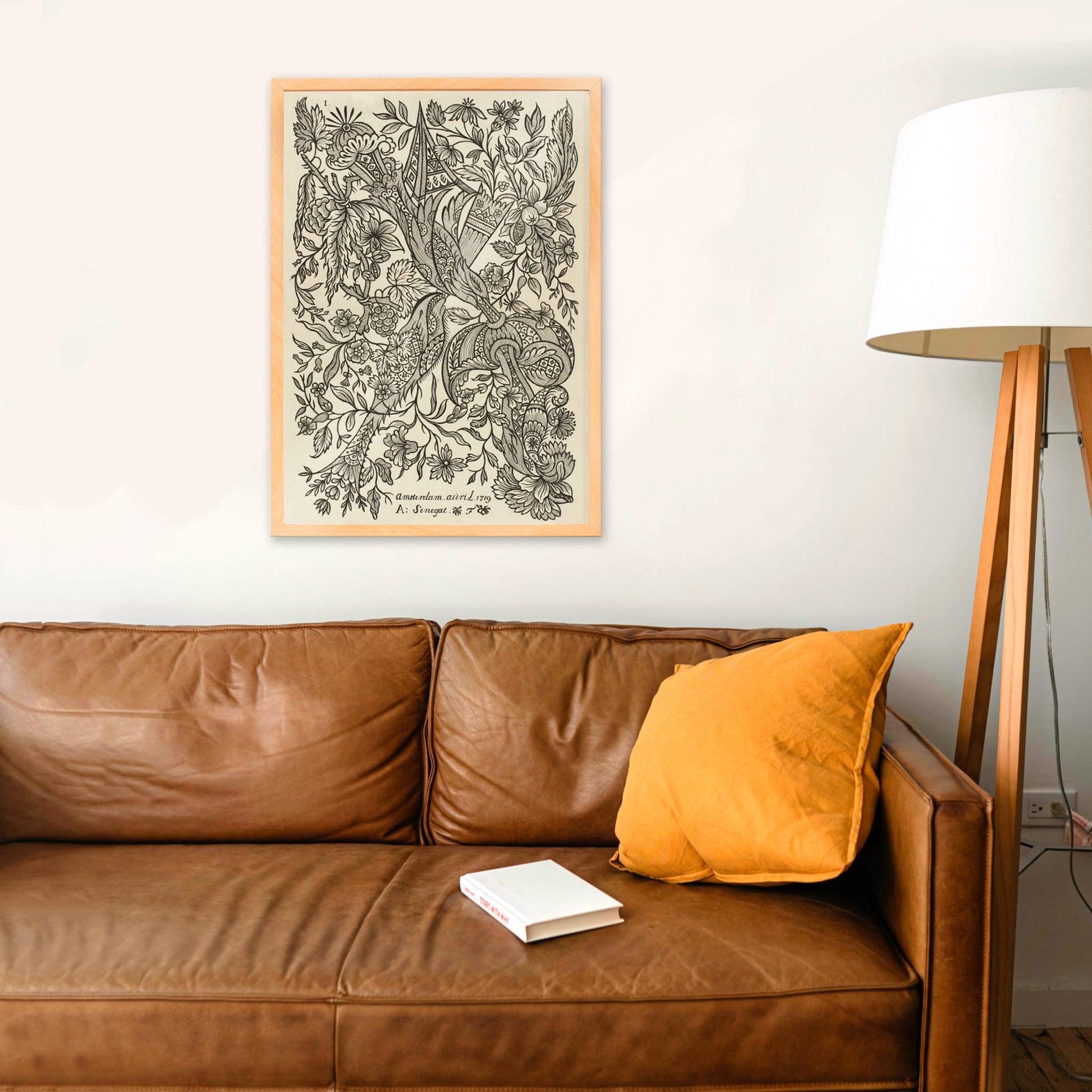 Intricate black and white floral textile pattern artwork poster by Alexander Senegat, framed and displayed in home decor