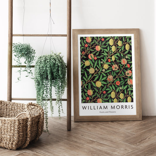 Colorful fruit and floral pattern artwork by William Morris featuring detailed branches leaves and vibrant fruits ideal for home decor, framed and displayed in home decor