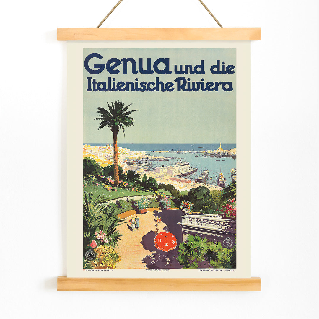 Vintage travel poster of Genoa and the Italian Riviera by Aurelio Craffonara featuring scenic harbor palm trees and colorful garden, with wooden magnetic frame on white background