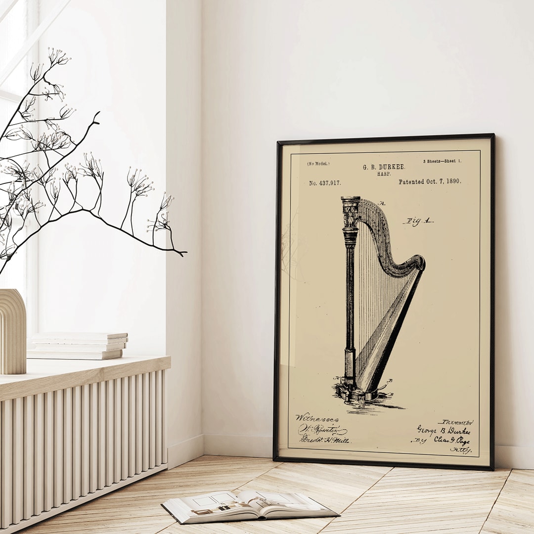 Harp patent drawing and poster by G B Durkee featuring detailed technical drawing and historical patent information, framed and displayed in home decor