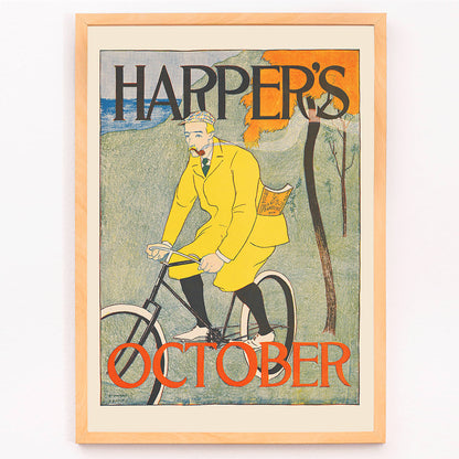 Man riding bicycle in autumn landscape wearing yellow outfit Harper for October poster by Edward Penfield with title displayed at top and bottom, framed and displayed in modern living room decor
