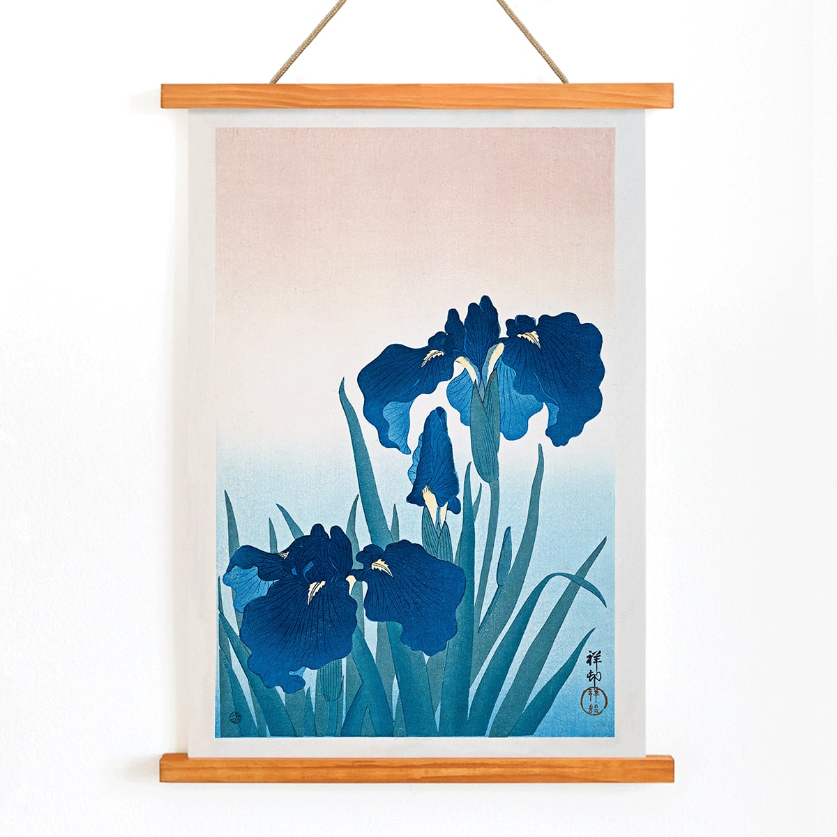 Poster of vibrant blue irises with green leaves on a gradient background artwork Blue Irises by Ohara Koson, with wooden magnetic frame on white background