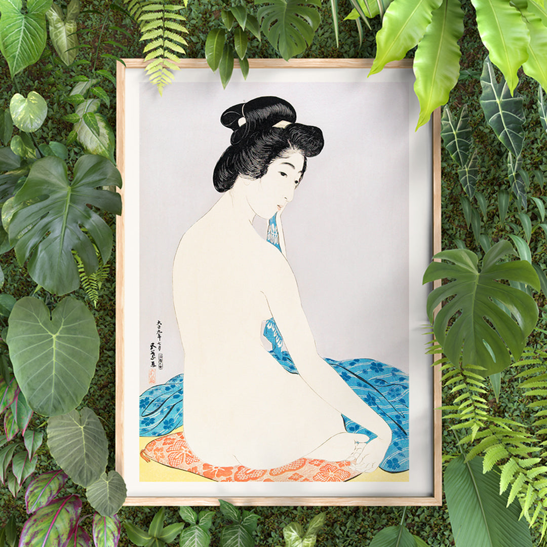 Japanese woman sitting with towel and nude woman on colorful fabrics in Woman After a Bath by Goyo Hashiguchi poster, framed and displayed in home decor
