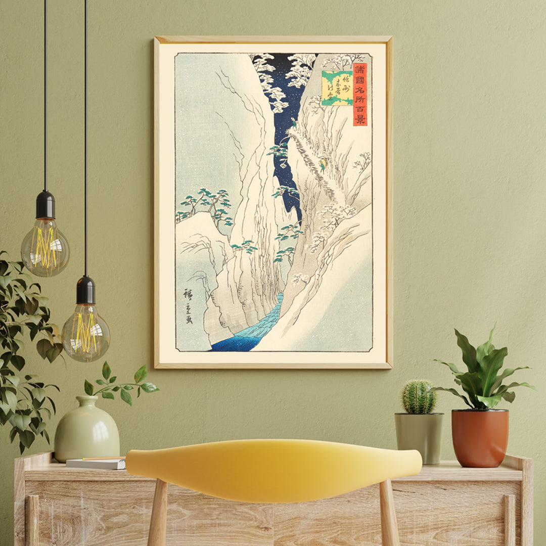 Snowy mountain gorge with river travelers and trees in The Kiso Gorge in Snow Shinano Province by Hiroshige II Japanese artwork poster, framed and displayed in home decor