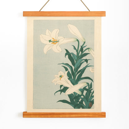 White lilies floral artwork by Ohara Koson with green leaves on light blue background poster Lelies flowers, with wooden magnetic frame on white background