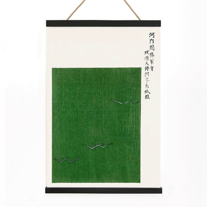 Minimalist Japanese vintage woodblock print poster of green field with birds by Taguchi Tomoki from Yatsuo no tsubaki, with wooden magnetic frame on white background