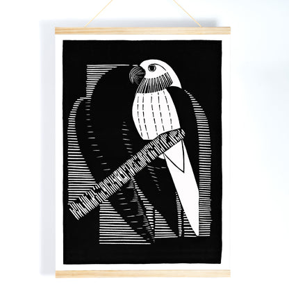 Black and white geometric parakeet artwork by Samuel Jessurun de Mesquita titled Parakeets Parkieten poster featuring parakeet on branch, with wooden magnetic frame on white background