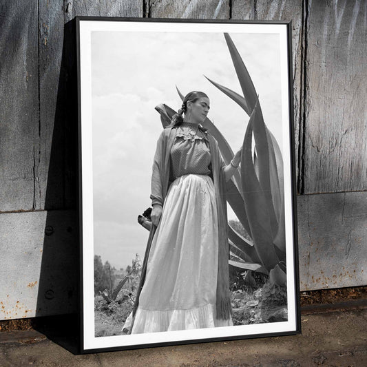 Frida Kahlo standing by agave plant black and white photograph and poster by Toni Frissell titled Senora Diego Rivera, framed and displayed in home decor