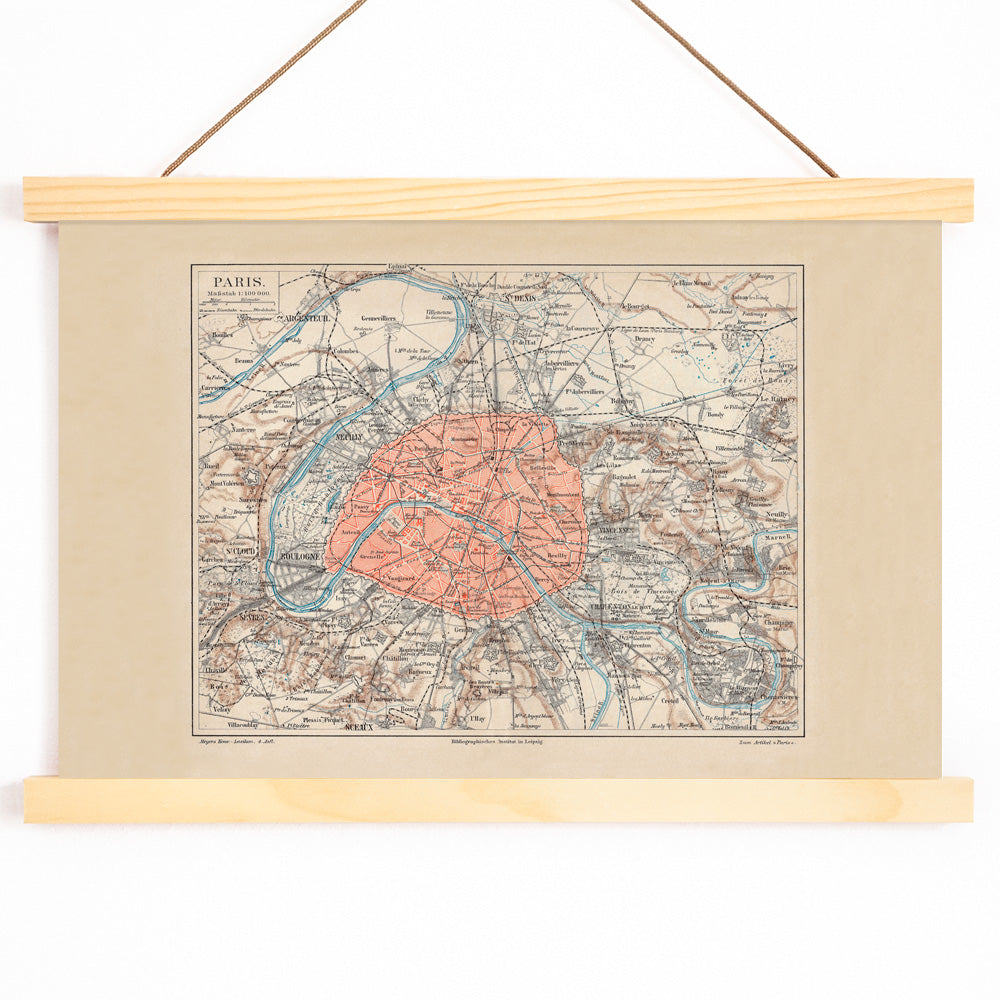 Ancient map of Paris city and surroundings by Bibliographic institute of Liepzig with detailed streets and highlighted city center poster artwork, with wooden magnetic frame on white background