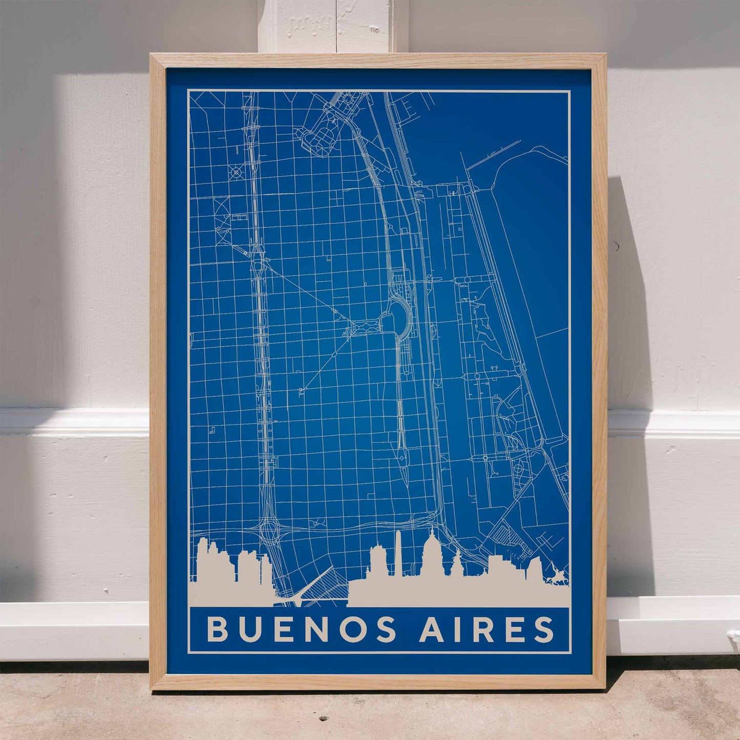 Minimalist Buenos Aires Map wall art poster featuring city streets and landmarks by Minimalist artist, framed and displayed in home decor