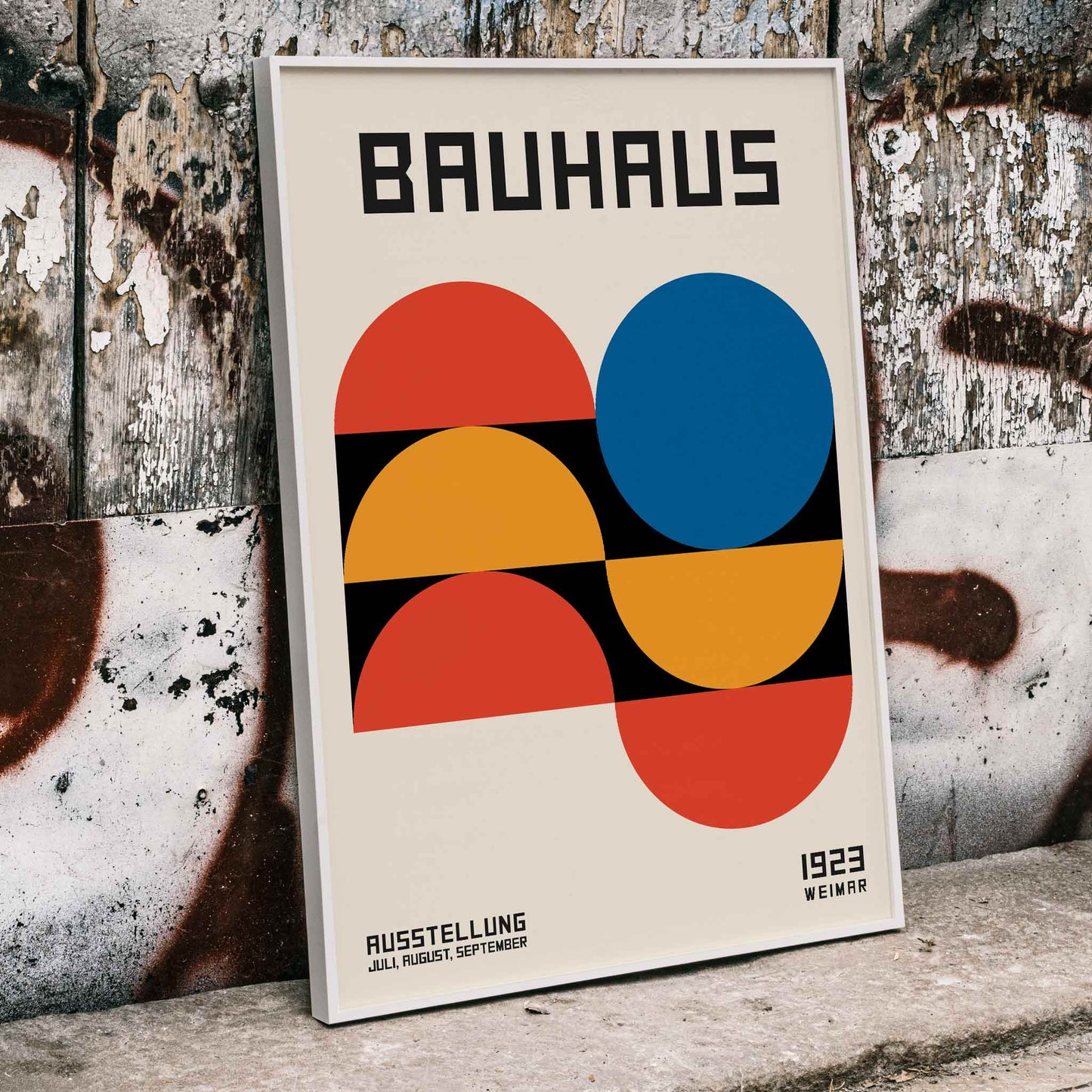 Bauhaus Poster 18 with bold geometric shapes in red blue and yellow on a white background minimalist design primary colors and Bauhaus text at the top, framed and displayed in home decor