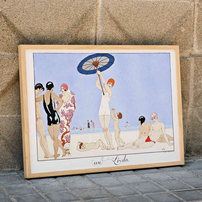 Art Deco beach scene with women children and people in swimsuits relaxing and playing on the beach Au Lido Plate by George Barbier, framed and displayed in home decor