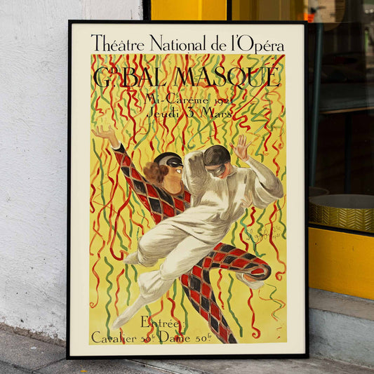 Colorful masquerade ball poster by Leonetto Cappiello featuring two masked dancers with vibrant streamers at the Grand Bal Theatre National De L Opera, framed and displayed in home decor
