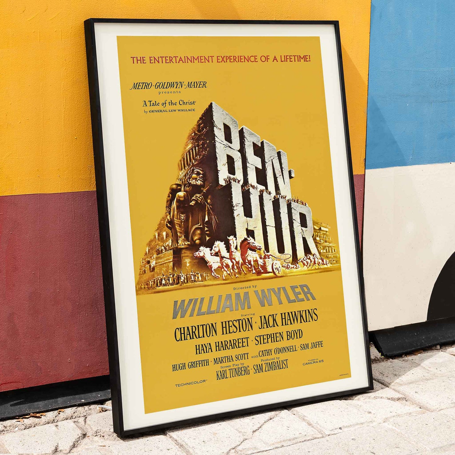 Ben-Hur film poster by William Wyler with Charlton Heston Jack Hawkins large stone chariot race horses and ancient Roman architecture, framed and displayed in home decor