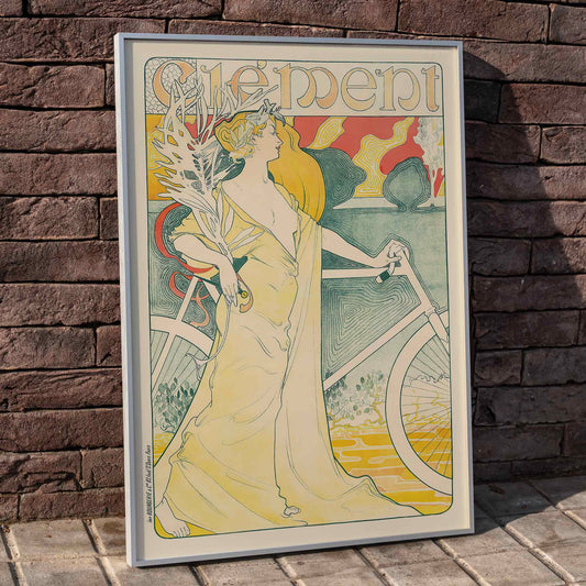 Art Nouveau poster of elegant woman in flowing gown holding bicycle by Arthur Foache Clement, framed and displayed in home decor