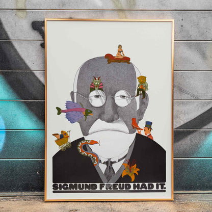 Surreal Sigmund Freud portrait and poster with colorful whimsical illustrations by Seymour Chwast, framed and displayed in home decor