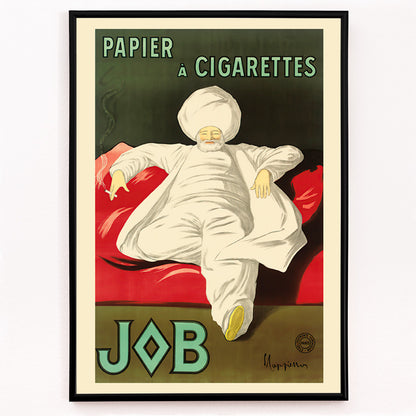 Closeup detail of Cigarette Rolling Paper Job poster by Leonetto Cappiello showing a relaxed man in white robes and turban reclining with a cigarette on a red couch
