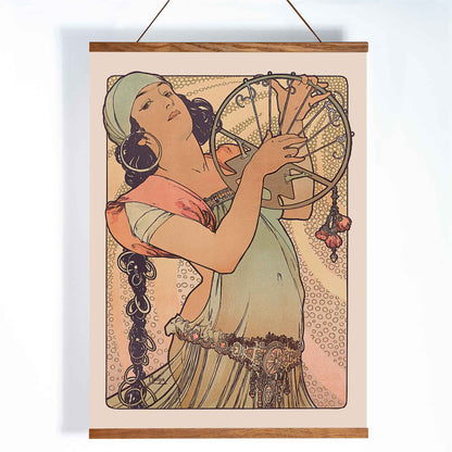 Alphonse Mucha Salome Art Nouveau poster elegant woman holding decorated circular motif in soft peach beige and green tones, with wooden magnetic frame on white background