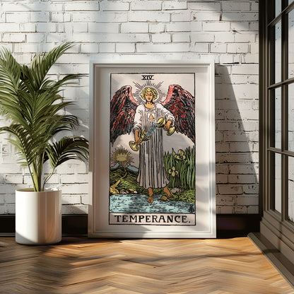 Temperance tarot card by Rider Waite featuring an angel with wings pouring liquid between two cups illustration and poster, framed and displayed in modern living room decor