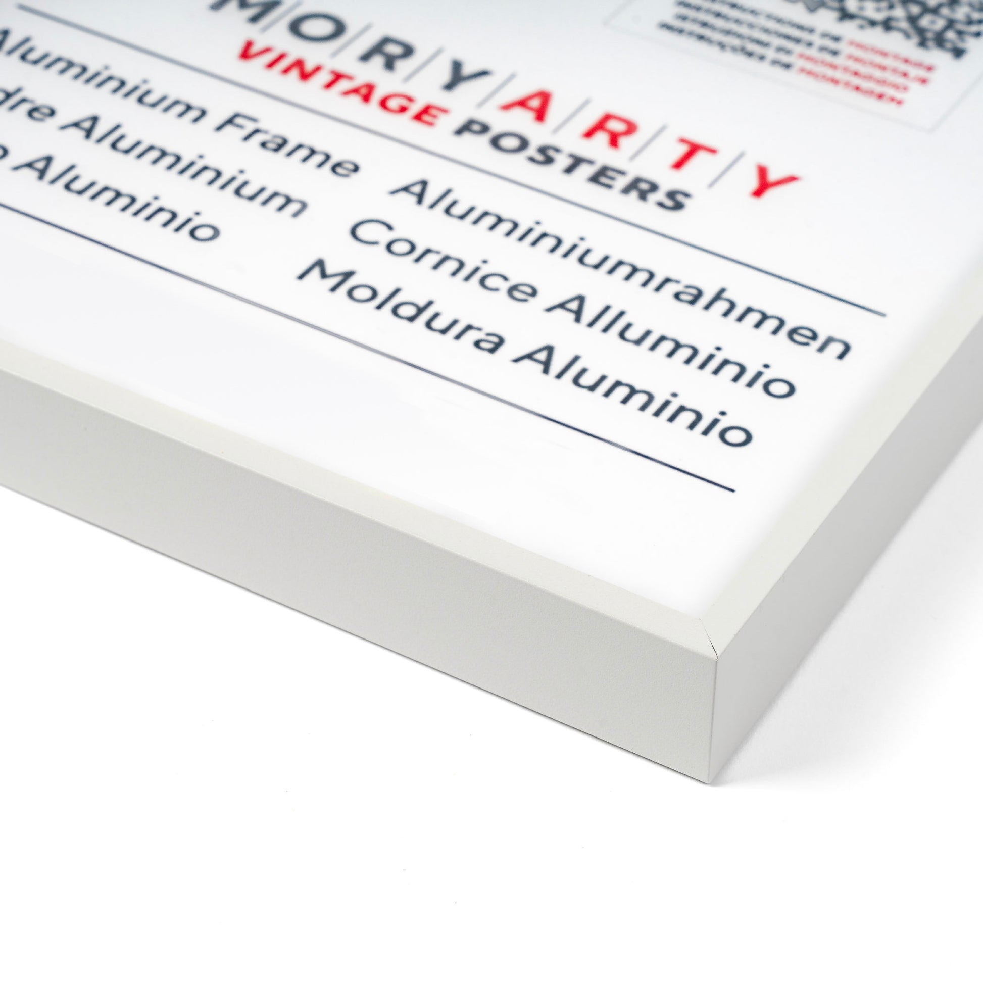 White aluminium picture frame with a minimalist design, clean lines, and a refined finish, suitable for displaying photos or art prints., front corner closeup picture