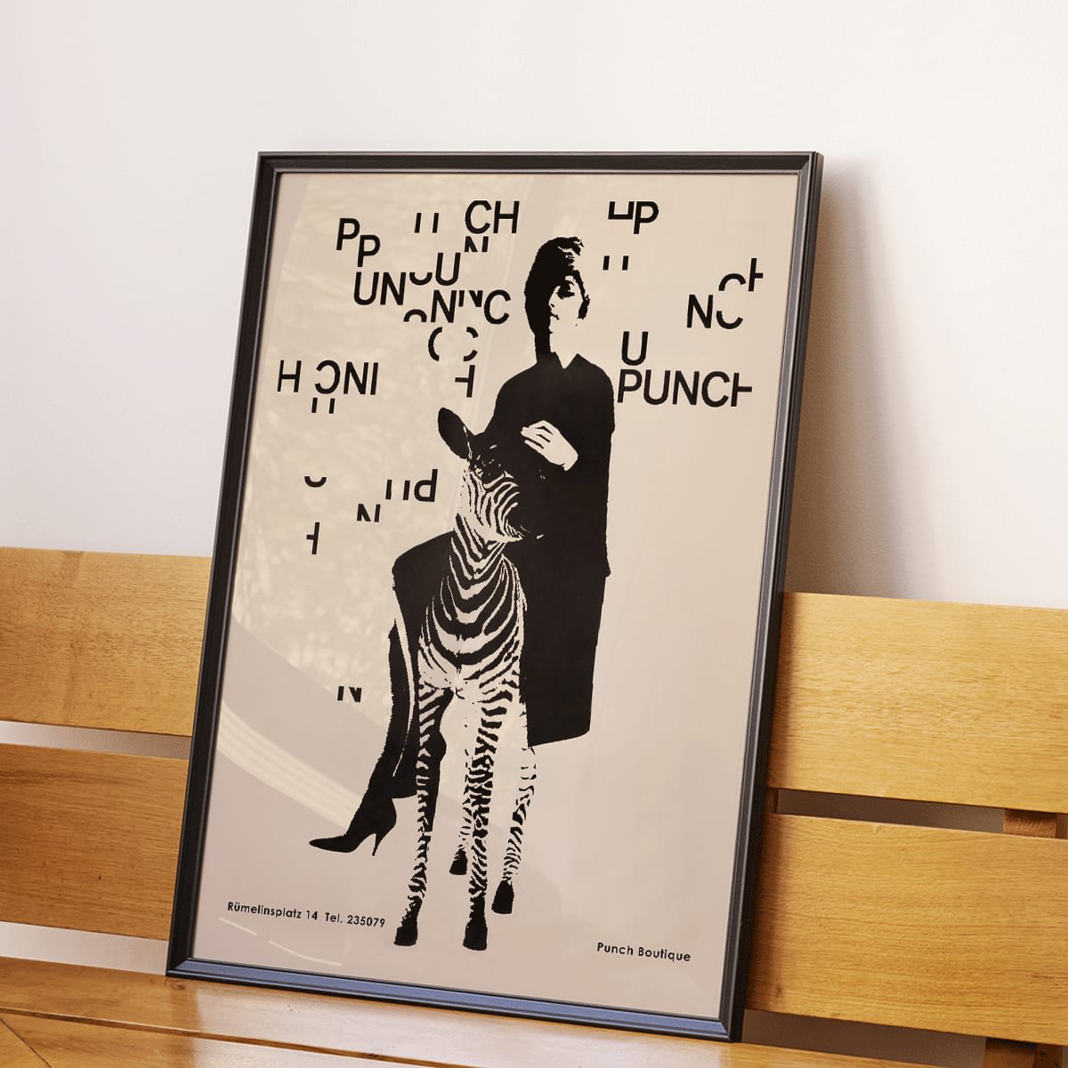 Fashionable woman with zebra by Paul Mitzkat Punch Boutique Poster featuring monochrome design and floating text elements, framed and displayed in modern living room decor